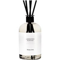 Laboratorio Olfattivo Biancothe diffuser 1000 ml, clear round bottle with black reeds and white label.