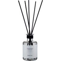 Clear glass diffuser bottle with black reeds and white label, "Laboratorio Olfattivo - Biancothe Diffuser 200 ml."