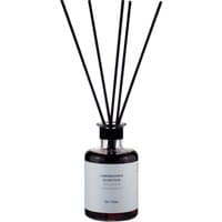 Clear glass bottle with black reeds, white label, and black cap, "Laboratorio Olfattivo - Di-Vino Diffuser 200 ml".