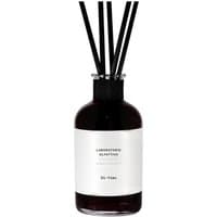 Dark glass bottle with white label, black reeds, and "Laboratorio Olfattivo - Di-Vino Diffuser 500 ml" text.