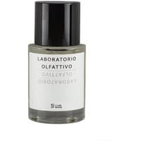 Clear glass bottle of Laboratorio Olfattivo Nun Eau de Parfum, black cap, white label with black text.