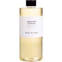 Clear bottle of Laboratorio Olfattivo Petali di Tiare floral diffuser refill with black cap and white label.