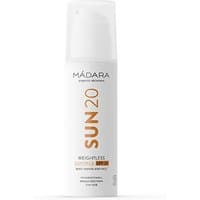 White bottle of Madara Weightless Sun Milk SPF 20 with orange text and pump dispenser, 150 ml size.