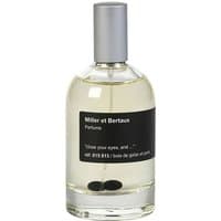 Clear glass bottle of Miller et Bertaux unisex fruity perfume with silver cap and black label.