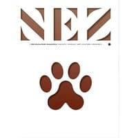 Nez Magazine Edition 7 with brown paw print on white cover, bold cut-out "NEZ" lettering at top.
