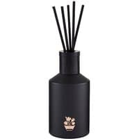 Black Noble Isle floral diffuser with sleek matte finish and black reeds.