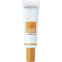 White tube of Novexpert La Creme au Caramel Dore BB face cream with gold cap and orange label.