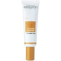 Novexpert La Creme au Caramel Ivoire BB face cream in a white tube with gold cap and caramel label, 30 ml.