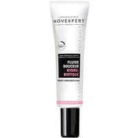 White tube of Novexpert moisturizing face fluid with black cap and pink label accents.