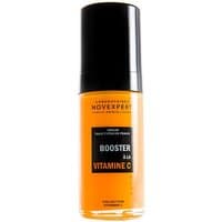 Orange Novexpert Vitamin C Serum Booster, 30 ml bottle with black cap and label, anti-aging for all skin types.