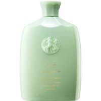 Light green Oribe Cleansing Crème bottle with embossed logo and gold text, 250 ml size for all hair types.
