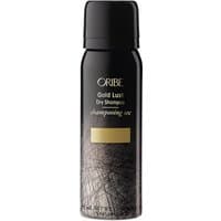 Black Oribe Gold Lust Dry Shampoo bottle with gold accents, 50 ml size, sleek design for all hair types.