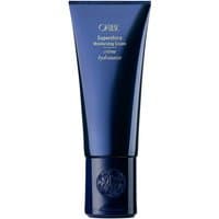 Oribe Supershine Moisturizing Cream in a sleek dark blue tube with a shiny cap, 147 ml for dry, dyed, and bleached hair.
