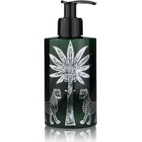 Dark green Ortigia Ambra Nera body cream bottle with black pump, palm tree and leopard design, 300 ml.