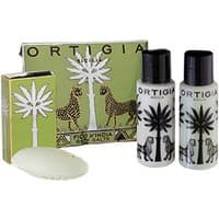 Ortigia Fico d'India gift set with two bottles, soap, and green box featuring palm tree and leopard design.