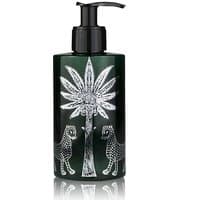 Ortigia Florio Body Cream 300 ml in dark green bottle with black pump, palm tree and leopard design.