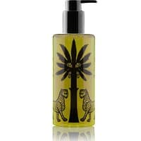 Ortigia Lime di Sicilia shower gel, 250 ml, yellow bottle with black palm tree and leopard design, black pump.