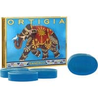 Ortigia Sandalo soap kit with four blue oval glycerine soaps and a box featuring a decorative elephant design.