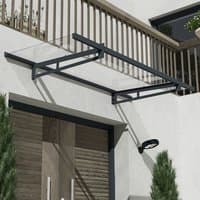 Grey clear door canopy with sleek metal frame and transparent panel, mounted above a modern doorway.