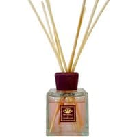 Clear square bottle with wooden reeds, maroon cap, and Profumo di Campiglio label; fruity diffuser 500 ml.