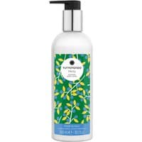 White bottle of Tuttotondo Mirto Body Lotion with green and yellow leaf design, black pump top.