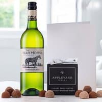 War Horse Chenin Blanc bottle, 12 chocolate truffles in black box, and a white occasion card.