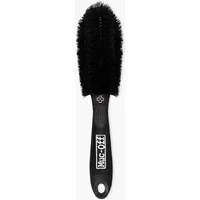 Black Muc-Off Wheel and Component Brush with dense bristles and ergonomic handle featuring a logo.